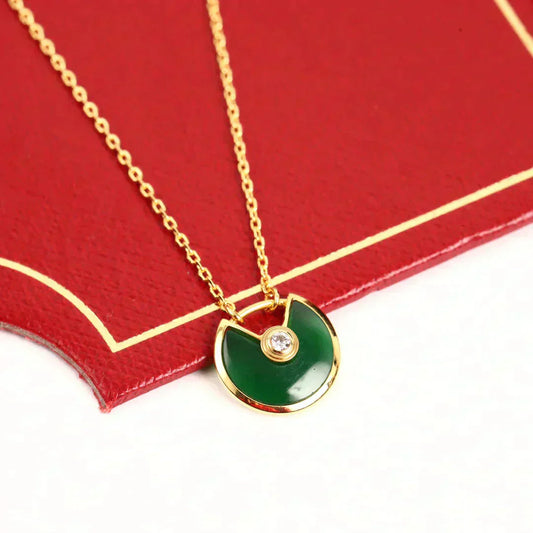 CARTIER AMULETTE GOLD MALACHITE NECKLACE