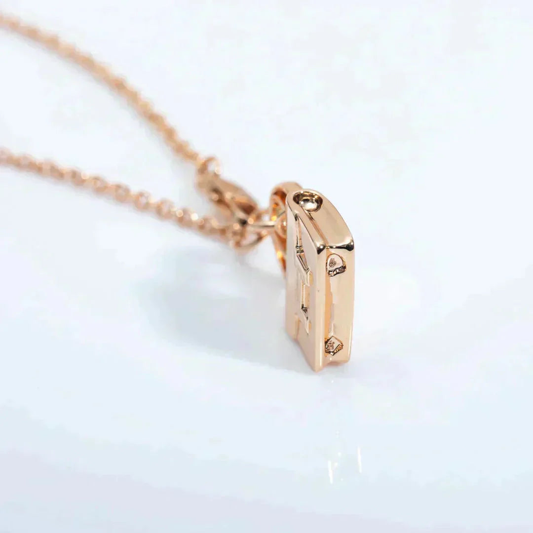 HERMES AMULETTE PEDANT ROSE GOLD NECKLACE