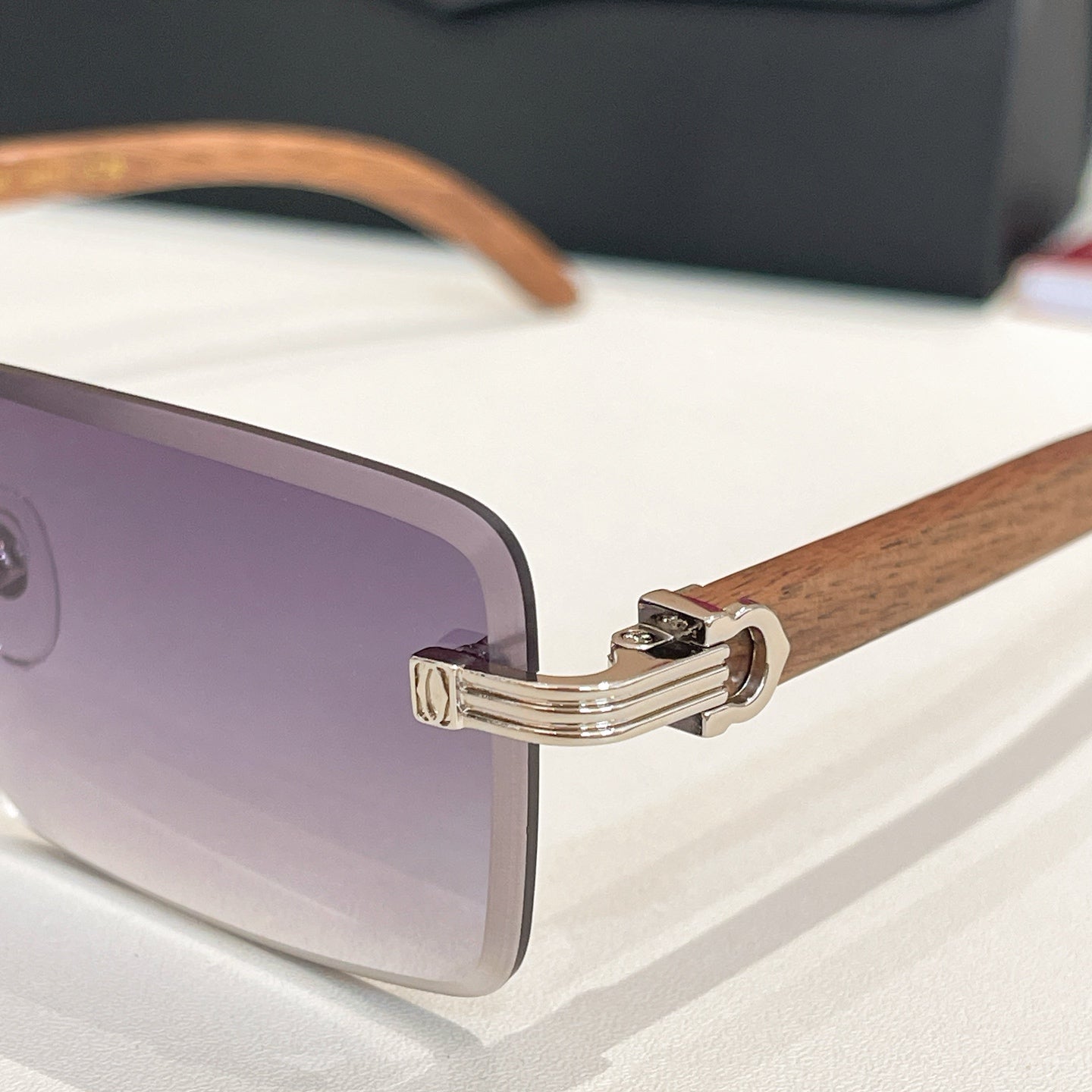 CARTIER RIMLESS RECTANGULAR FRAME SUNGLASSES CT0619S IN METAL AND WOODEN