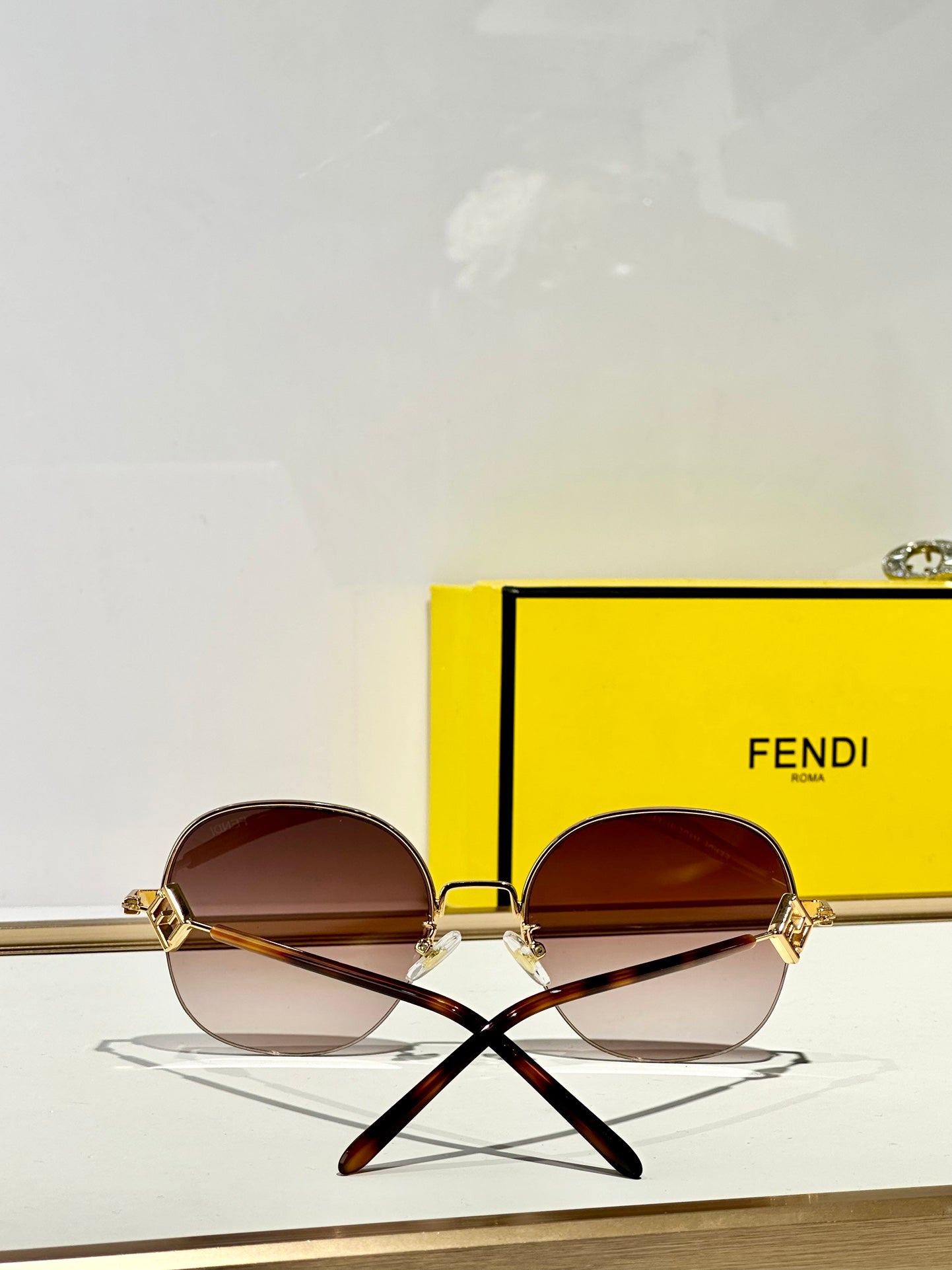 FENDI TRAVEL ROUND FRAME SUNGLASSES FD8136 IN METAL