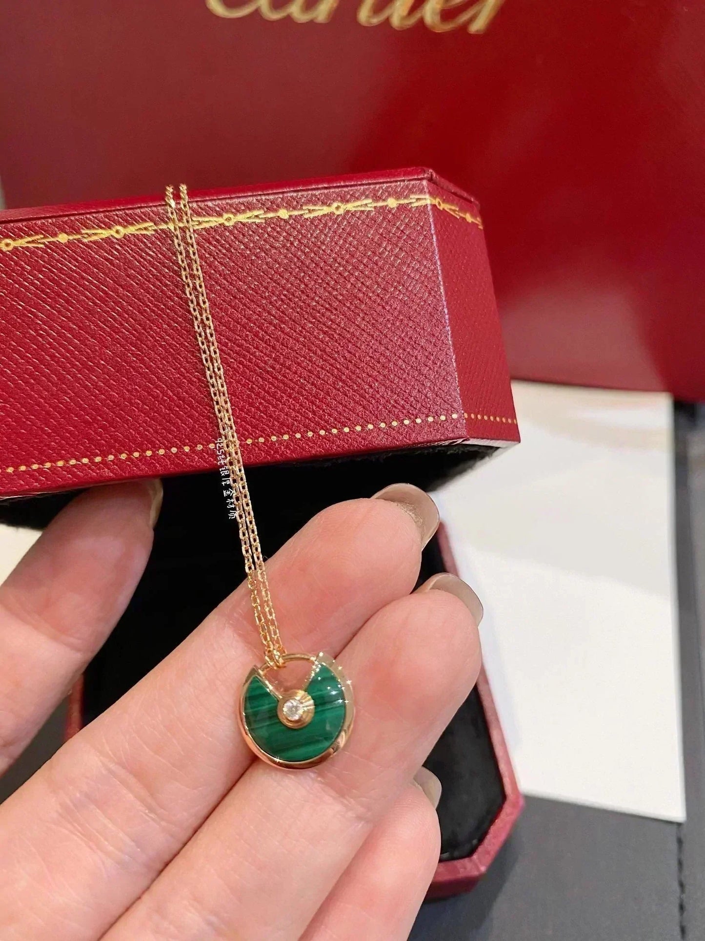 CARTIER AMULETTE ROSE GOLD MALACHITE NECKLACE