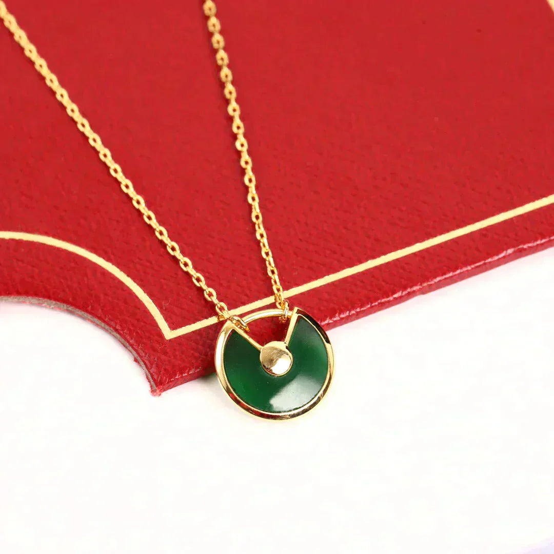 CARTIER AMULETTE GOLD MALACHITE NECKLACE