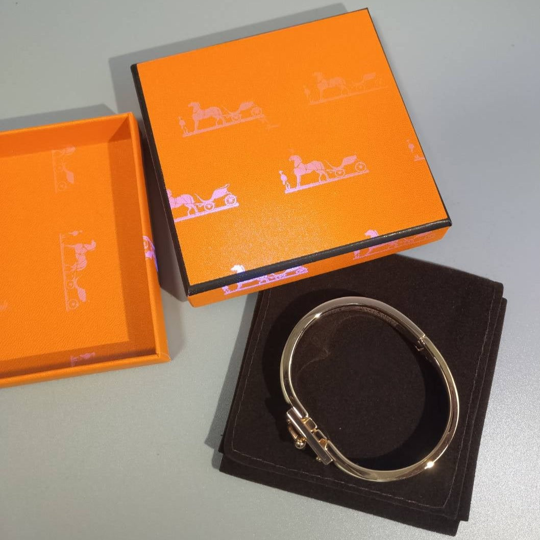 HERMES H YELLOW BRACELET