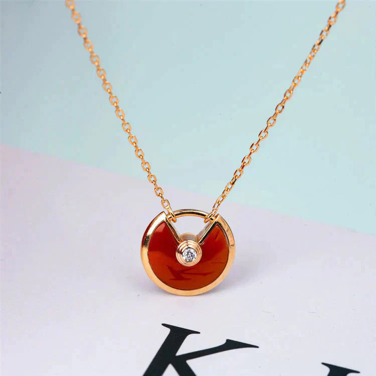 CARTIER AMULETTE GOLD CARNELIAN ONYX NECKLACE