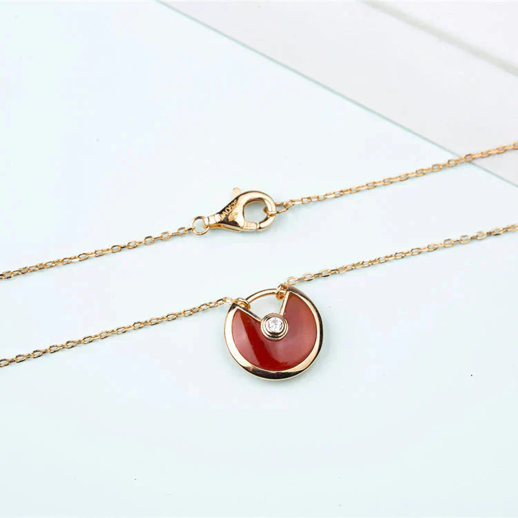 CARTIER AMULETTE GOLD CARNELIAN ONYX NECKLACE
