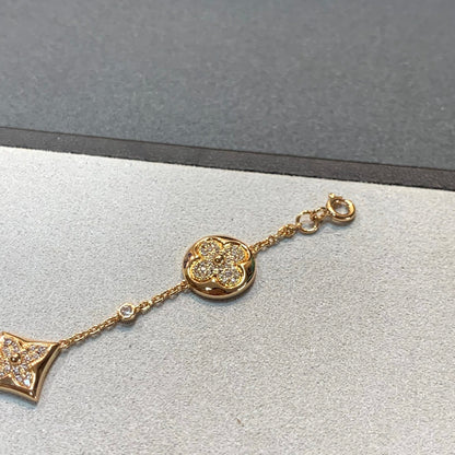 LOUIS VUITTON STAR AND SUN 4 MOTIFS GOLD DIAMONDS BRACELET