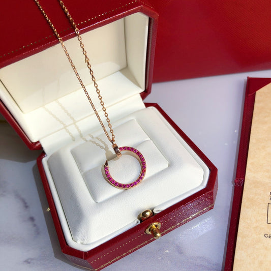 CARTIER JUSTE NECKLACE GOLD RED DIAMONDS