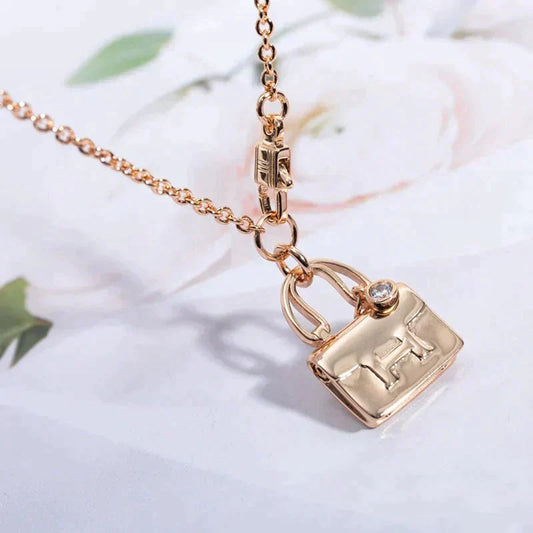 HERMES AMULETTE PEDANT ROSE GOLD NECKLACE