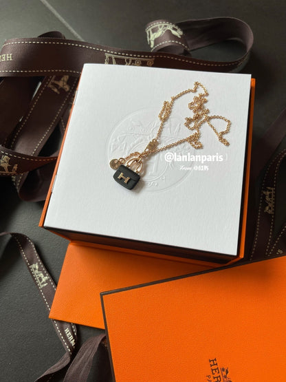 HERMES CONSTANCE BLACK PEDANT PINK GOLD NECKLACE