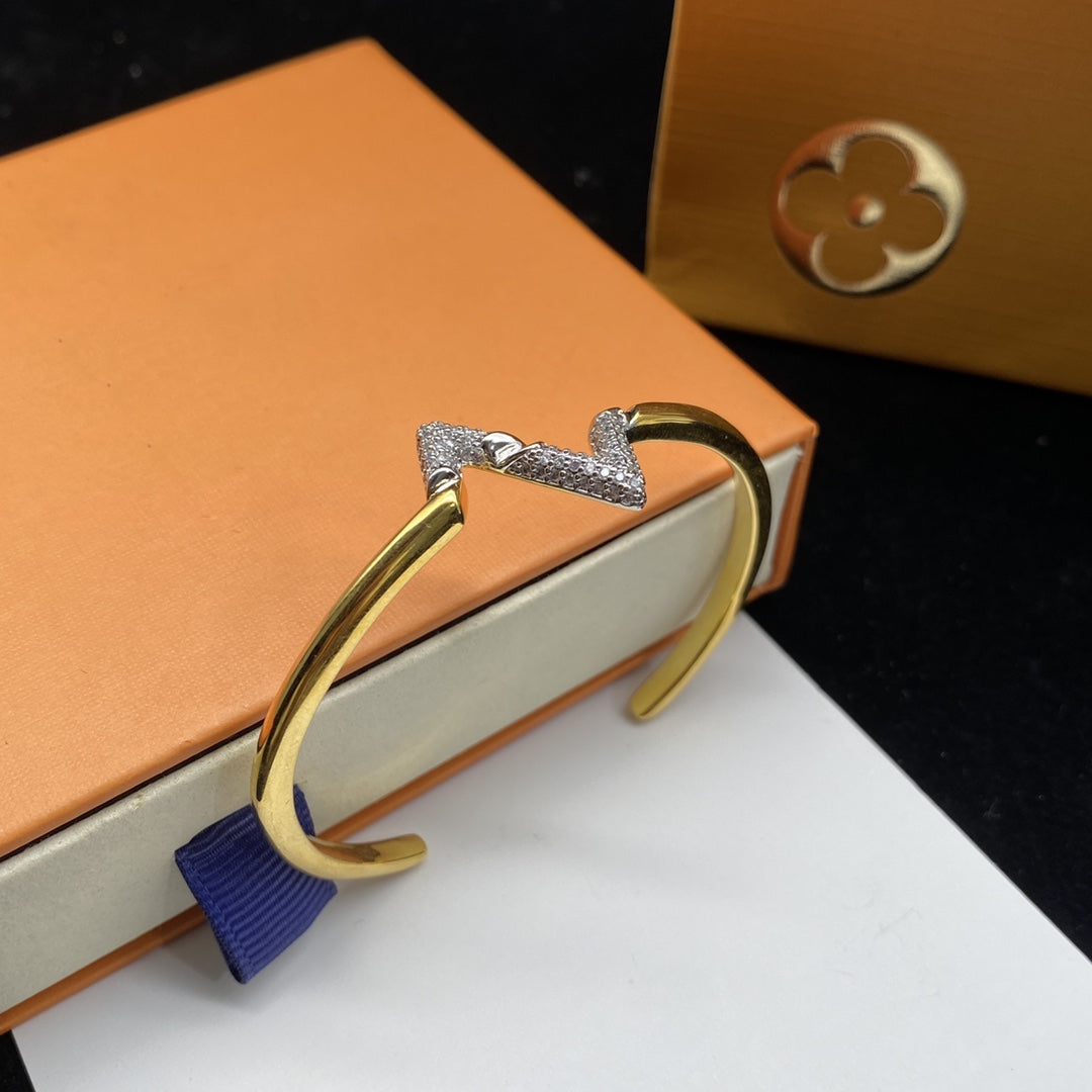 LOUIS VUITTON VOLTE UPSITE DOWN DIAMOND GOLD OPEN BRACELET