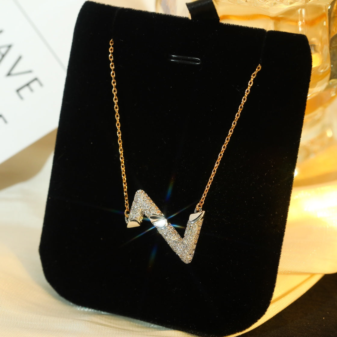 LOUIS VUITTON VOLT SILVER DIAMOND PEDANT NECKLACE