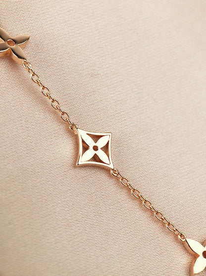 LOUIS VUITTON STAR AND SUN 7 MOTIFS GOLD BRACELET