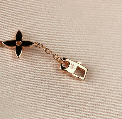 LOUIS VUITTON STAR AND SUN 7 MOTIFS GOLD BRACELET