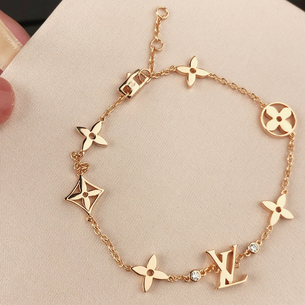 LOUIS VUITTON STAR AND SUN 7 MOTIFS GOLD BRACELET