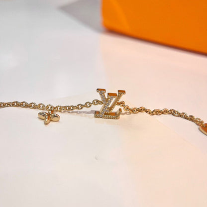 LOUIS VUITTON LOGO STAR MOTIF GOLD BRACELET