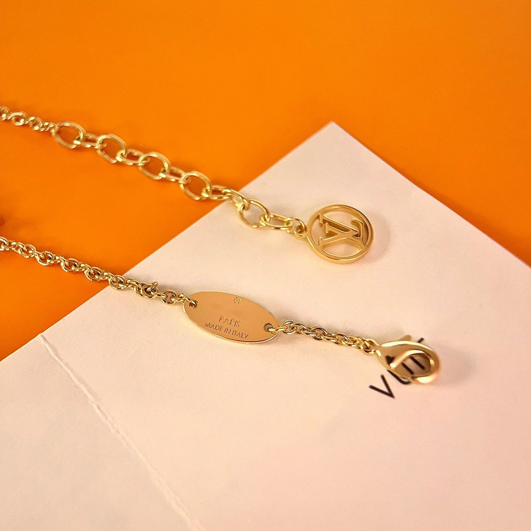 LOUIS VUITTON LOGO STAR MOTIF GOLD BRACELET