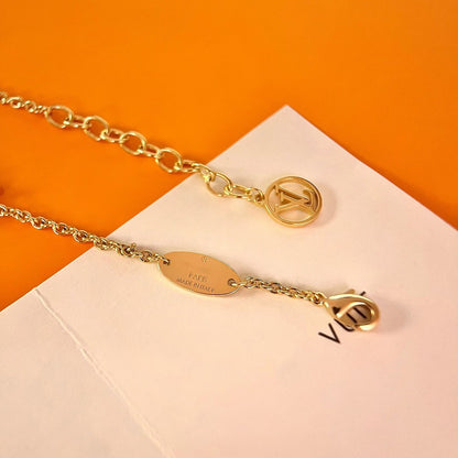 LOUIS VUITTON LOGO STAR MOTIF GOLD BRACELET