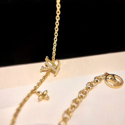 LOUIS VUITTON LOGO STAR MOTIF GOLD BRACELET