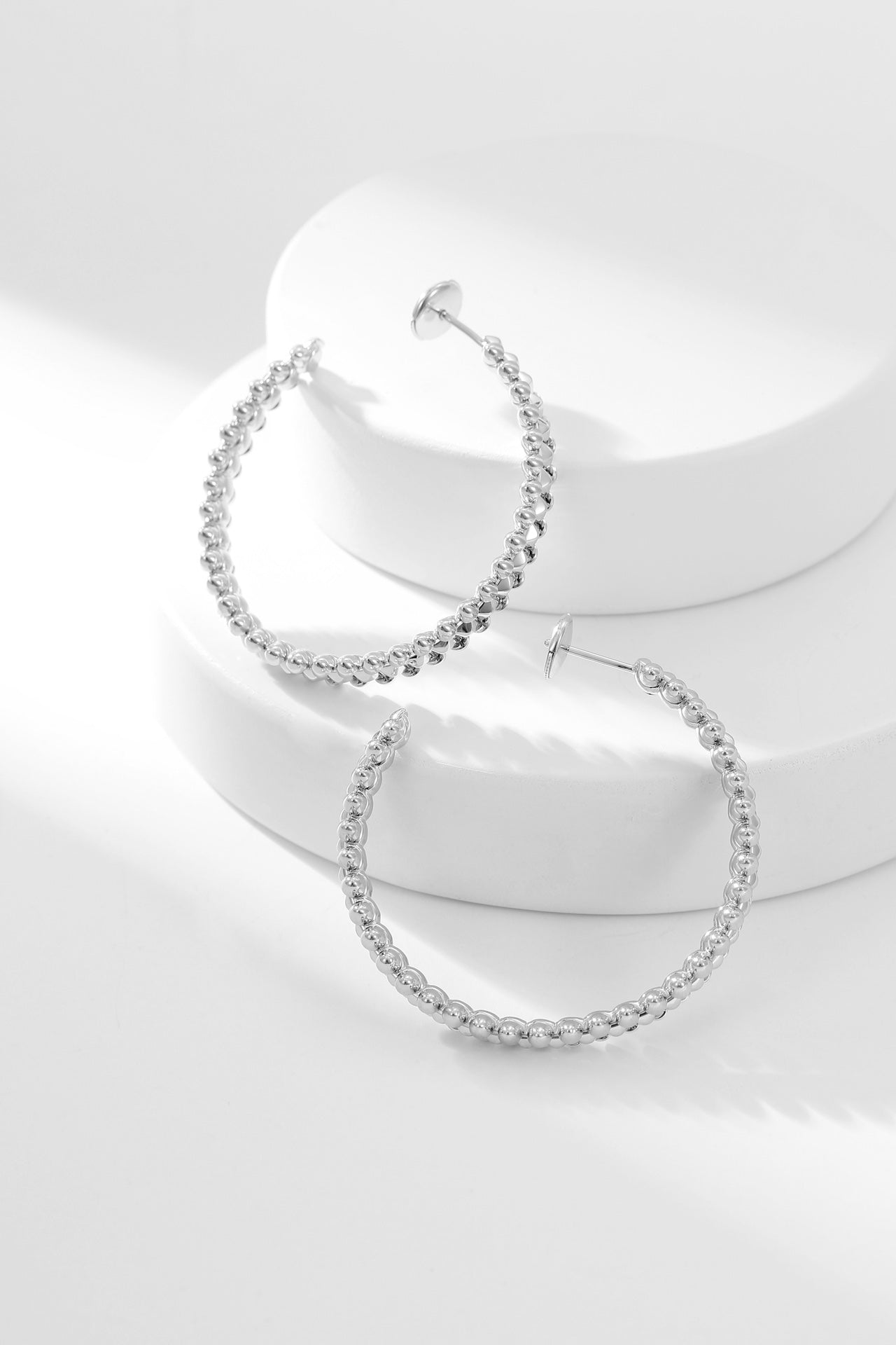 CARTIER CLASH HOOP EARRINGS