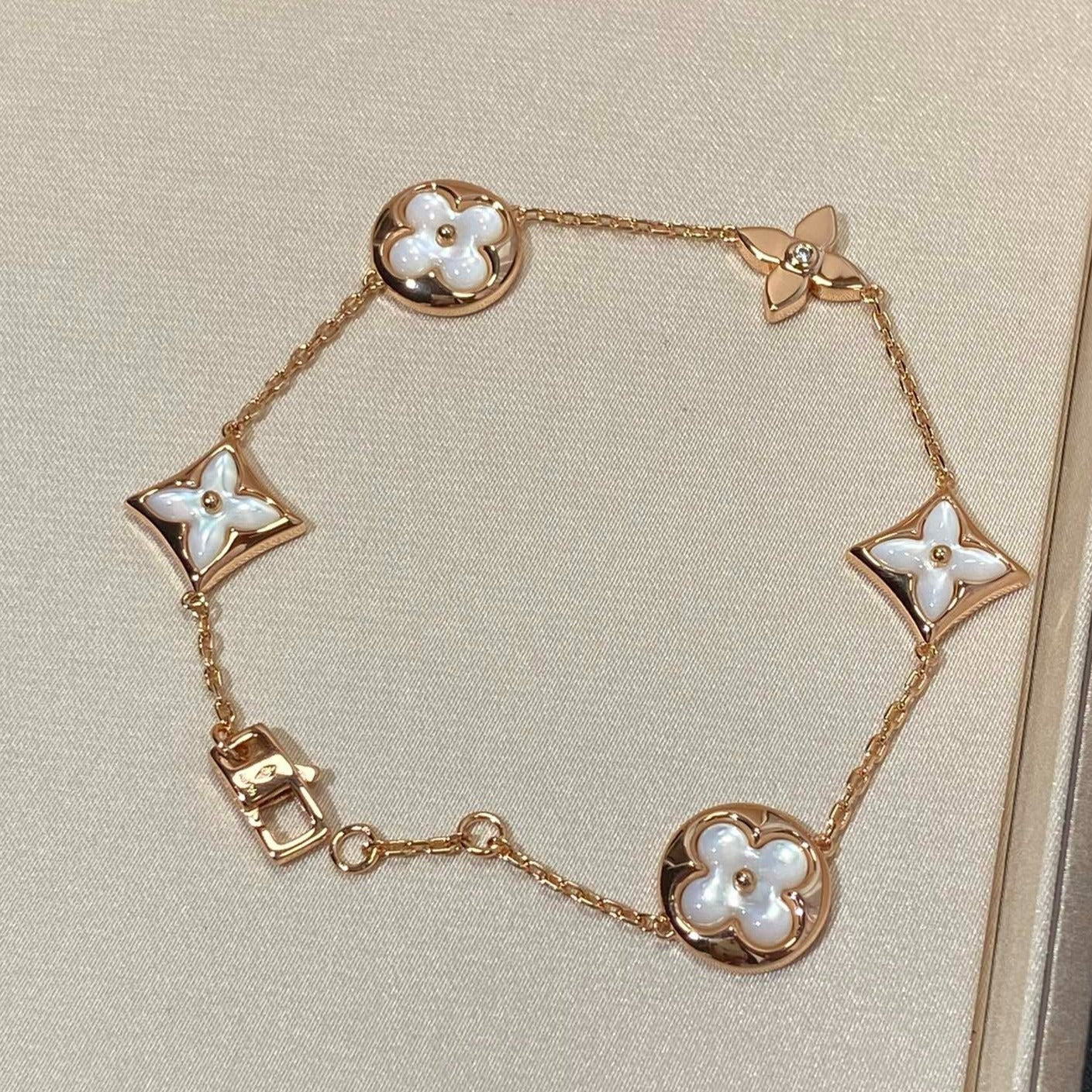 LOUIS VUITTON STAR AND SUN 5 MOTIF MOP PINK GOLD BRACELET