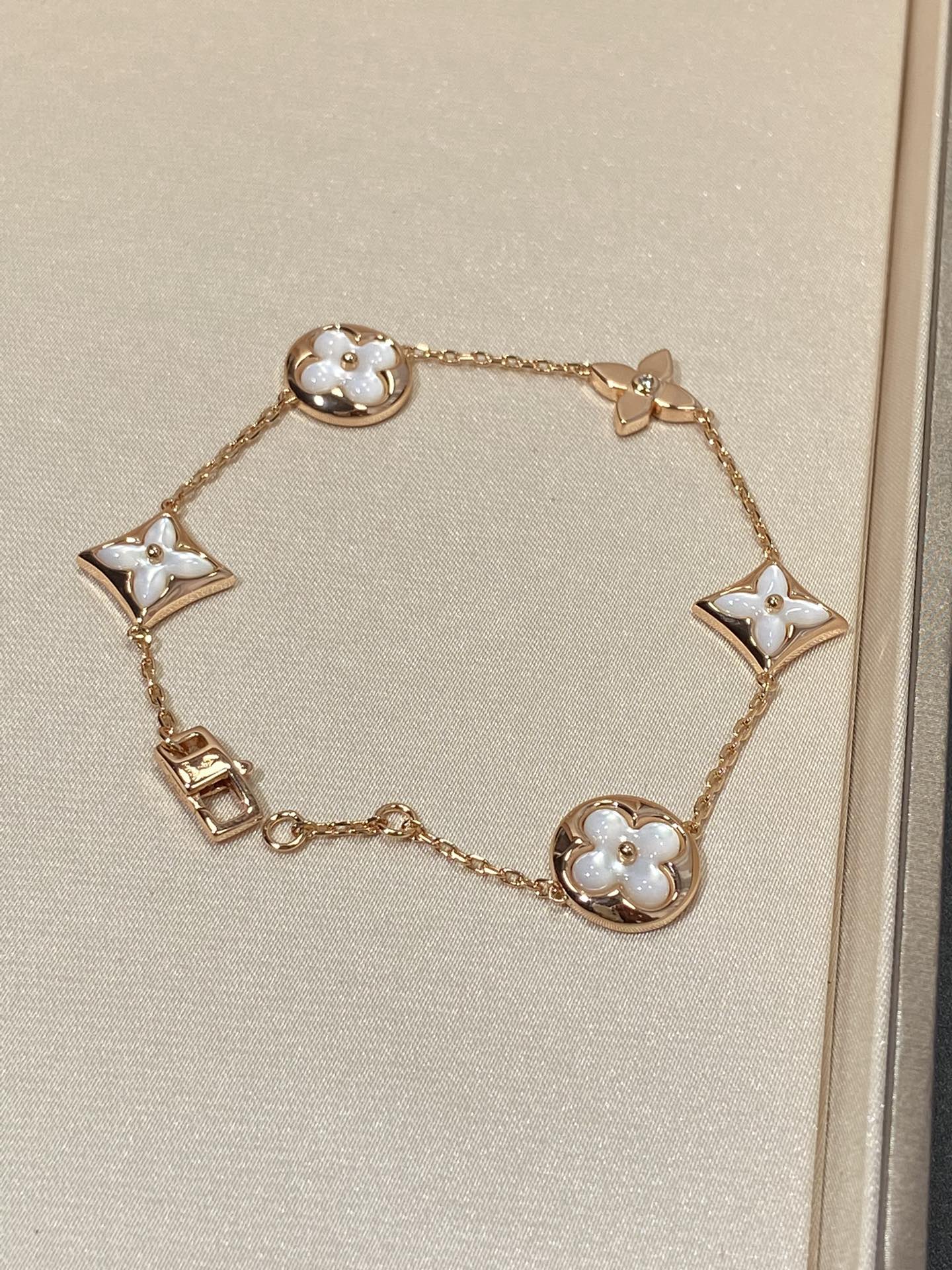 LOUIS VUITTON STAR AND SUN 5 MOTIF MOP PINK GOLD BRACELET