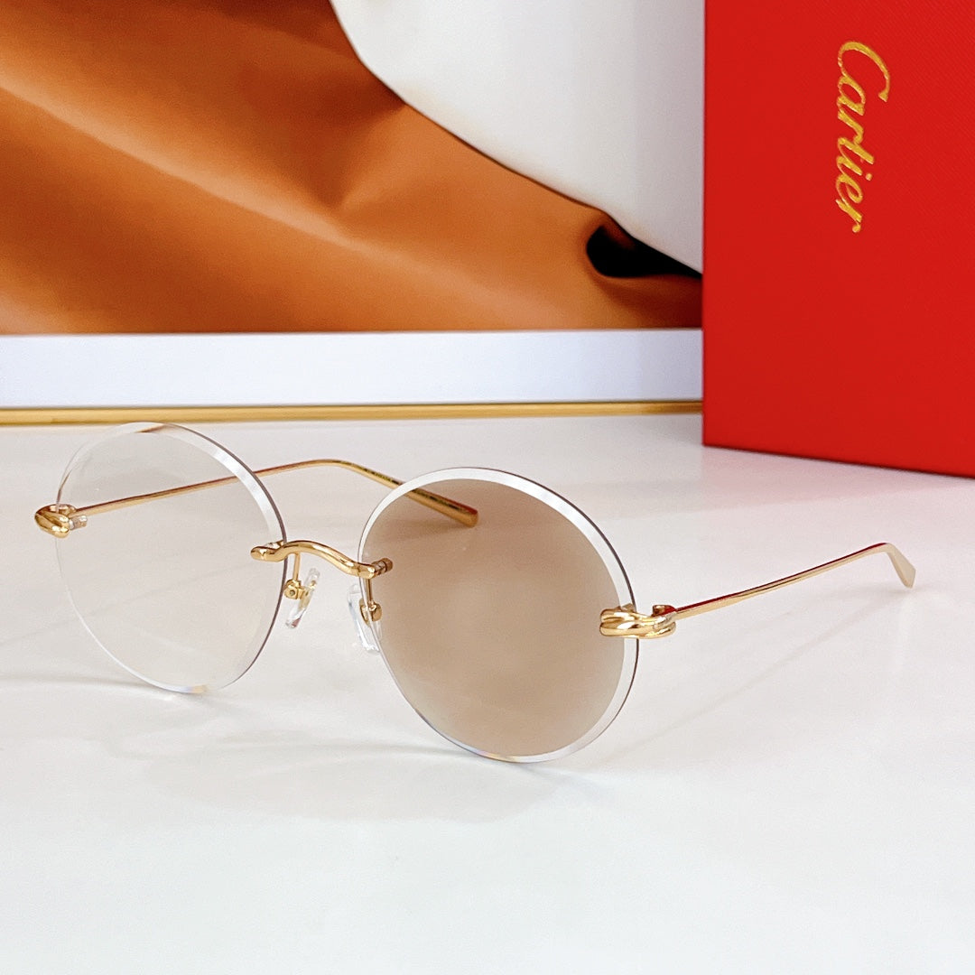 CARTIER PREMIÈRE RIMLESS ROUND FRAME SUNGLASSES CT0475 IN METAL