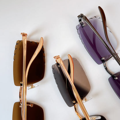 CARTIER PANTHÈRE RIMLESS RECTANGULAR FRAME SUNGLASSES CT0682S IN METAL
