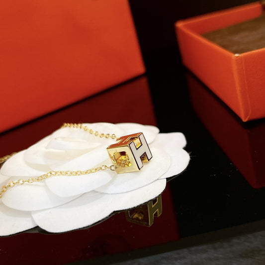 HERMES H WHITE SQUARE GOLD NECKLACE