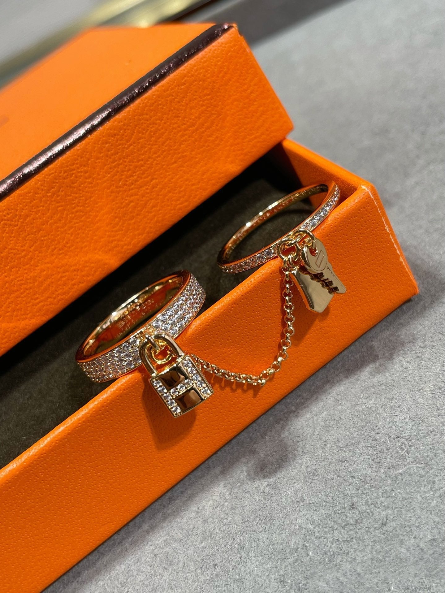 HERMES HM KELLY CLOCHETTE DOUBLE RING IN WITH DIAMONDS