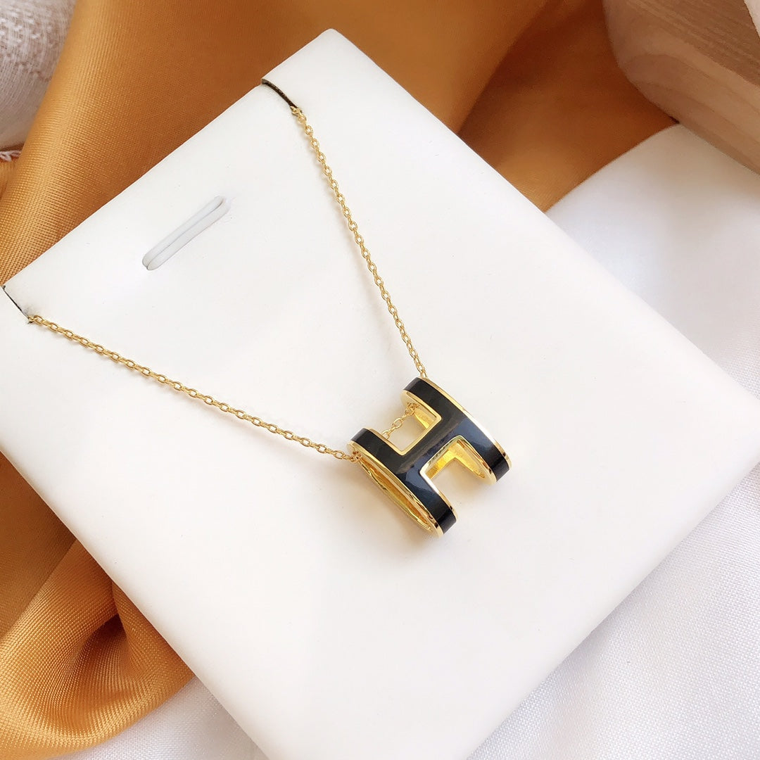 HERMES HM CLIC BLACK ENAMEL GOLD NECKLACE