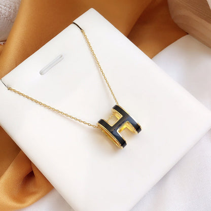 HERMES HM CLIC BLACK ENAMEL GOLD NECKLACE