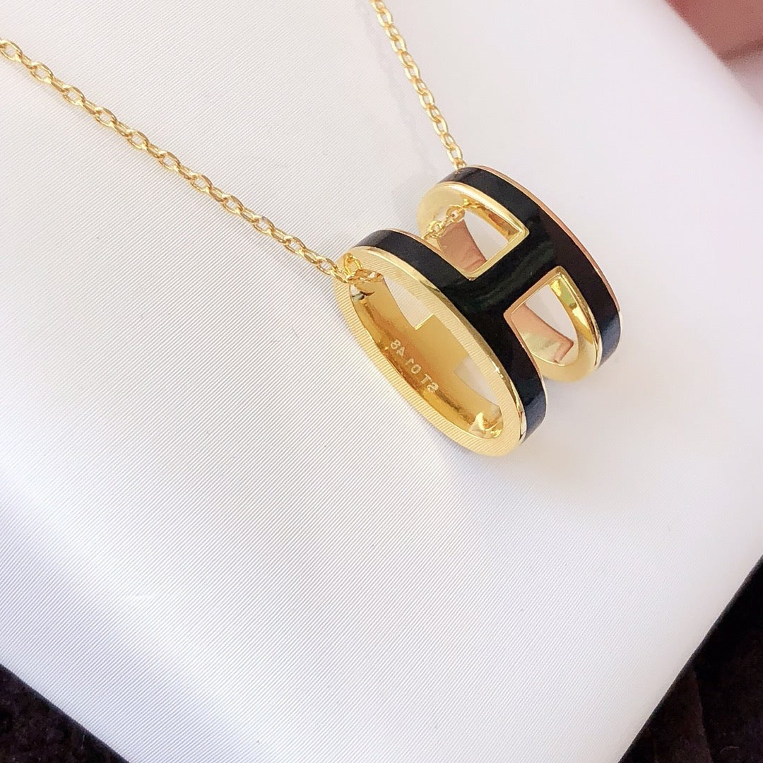 HERMES HM CLIC BLACK ENAMEL GOLD NECKLACE