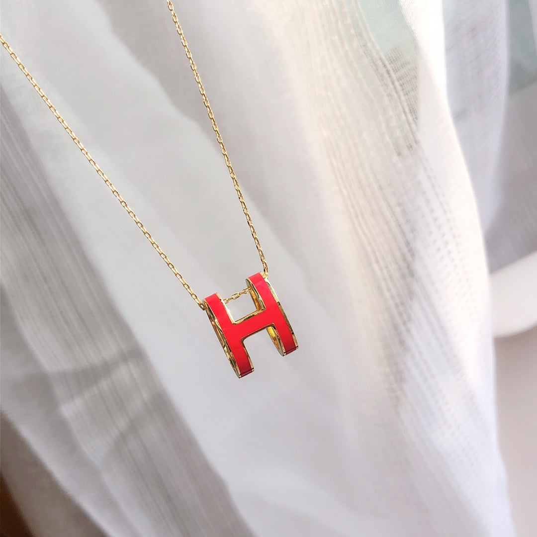 HERMES HM CLIC RED ENAMEL GOLD NECKLACE