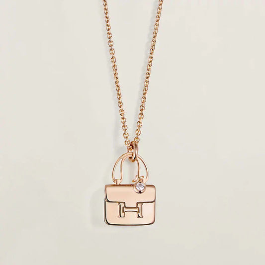 HERMES AMULETTE PEDANT ROSE GOLD NECKLACE