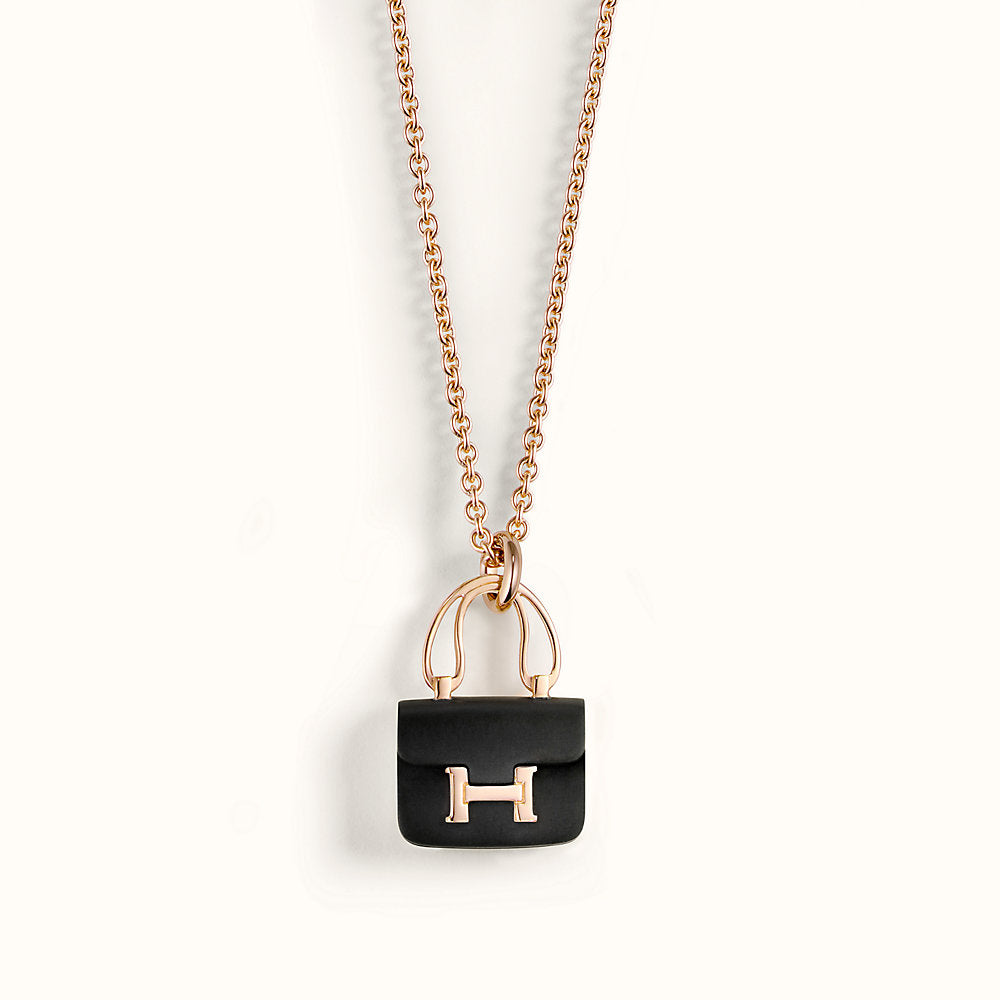 HERMES CONSTANCE BLACK PEDANT PINK GOLD NECKLACE