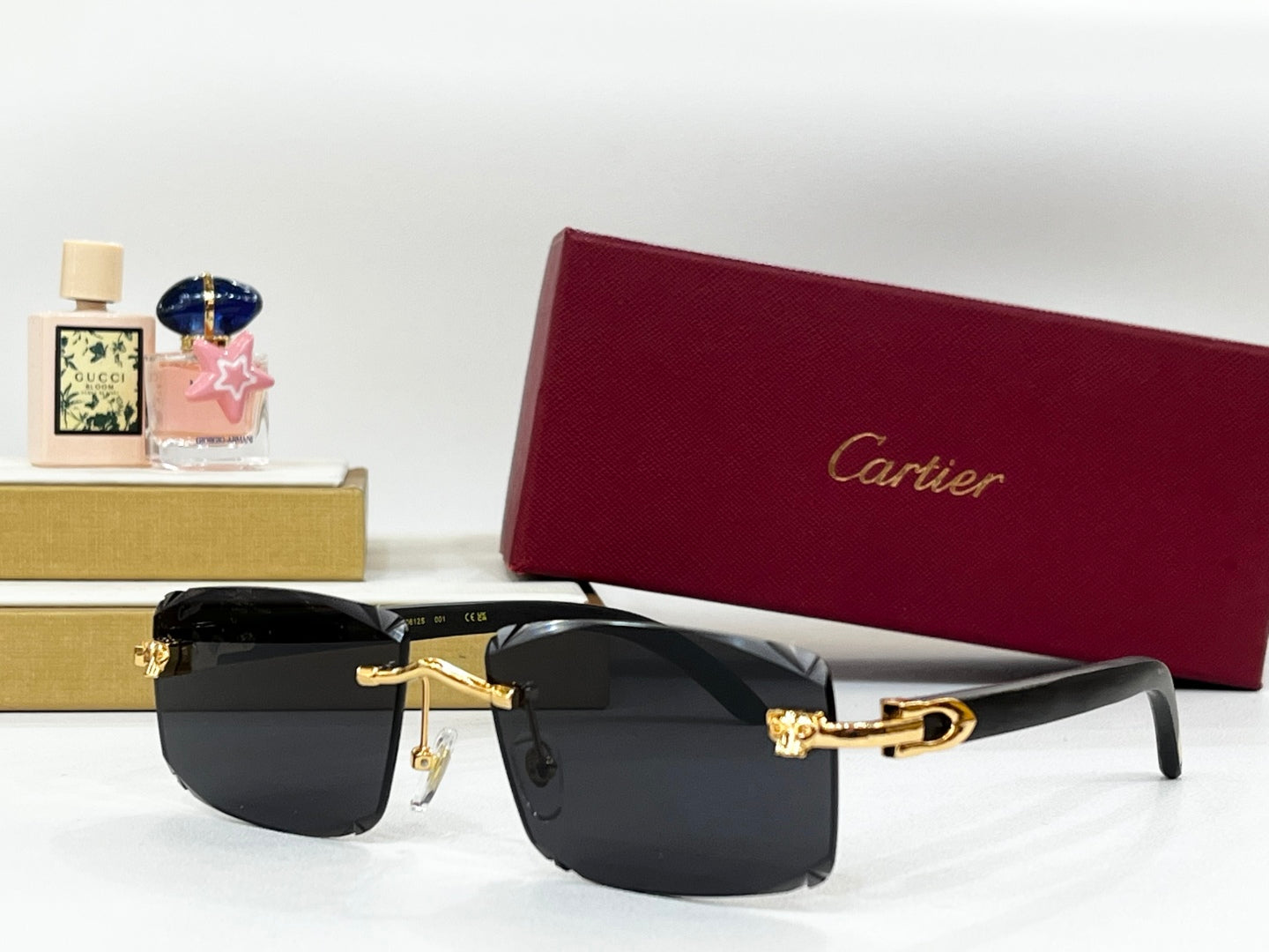 CARTIER RIMLESS RECTANGULAR FRAME SUNGLASSES CT0612S IN METAL