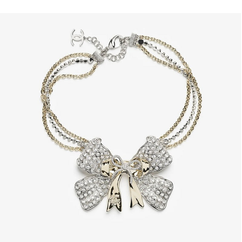 18K  Chanel 25K Bow Tie Choker Necklace