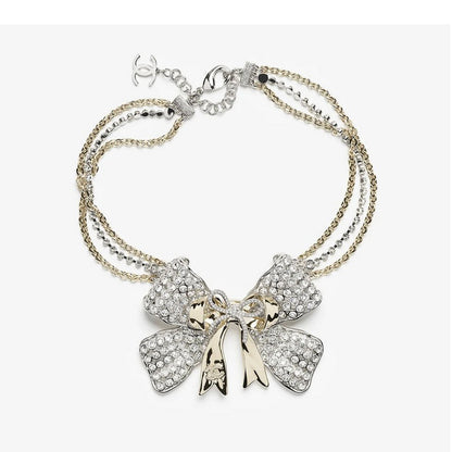 18K  Chanel 25K Bow Tie Choker Necklace