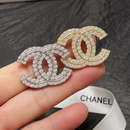 18K  Chanel Diamonds Set Broochs