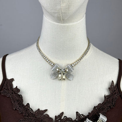 18K  Chanel 25K Bow Tie Choker Necklace