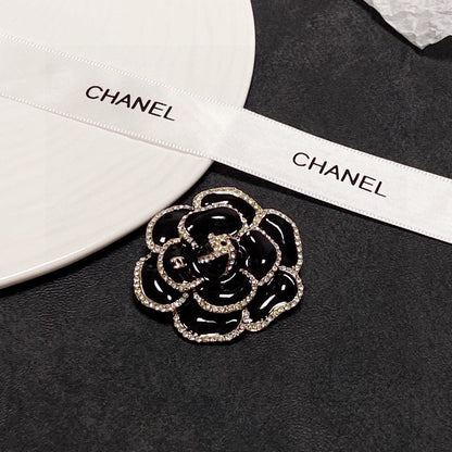 18K  Chanel Black Flower Brooch