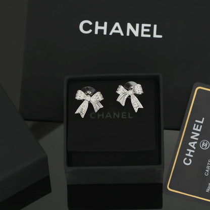 18K  Chanel Bow Tie Diamond Earrings