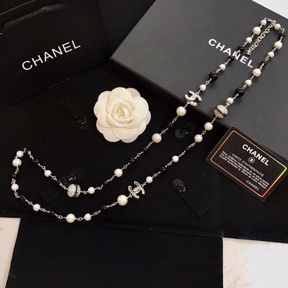 18K  Chanel Long Black Pearl Necklace