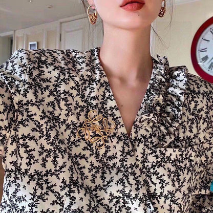 18K LOEWE Anagram Gold Brooch