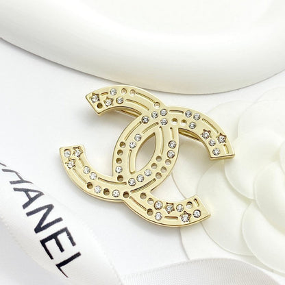 18K  Chanel 24A Diamond Gold Brooch