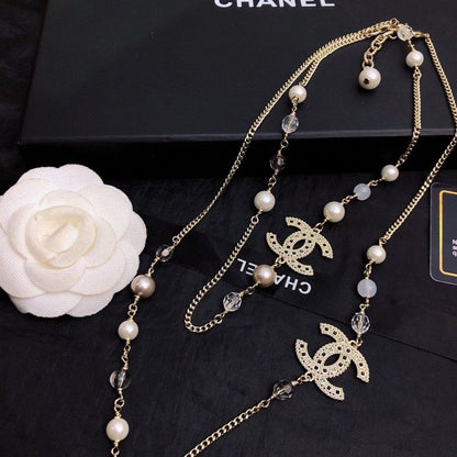 18K  Chanel Long Pearl Necklace