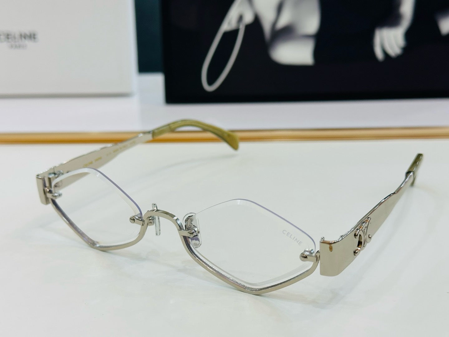 CELINE TRIOMPHE SEMI RIMLESS SUNGLASSES CL42117U IN METAL OCTAGON LENSES