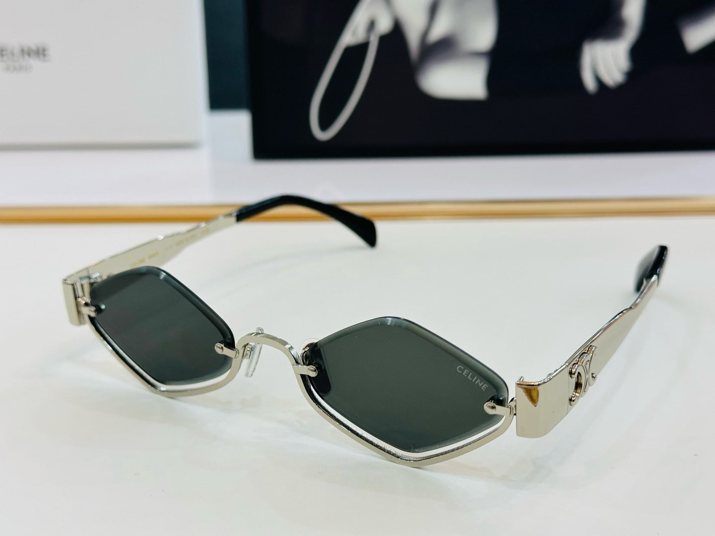 CELINE TRIOMPHE SEMI RIMLESS SUNGLASSES CL42117U IN METAL OCTAGON LENSES