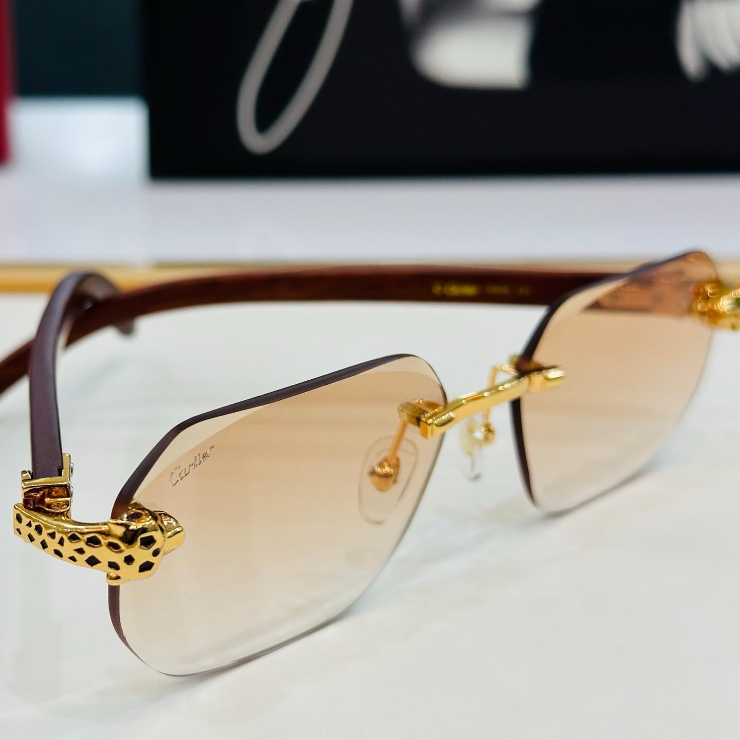 CARTIER PANTHÈRE RIMLESS OVAL FRAME SUNGLASSES 543637 IN METAL