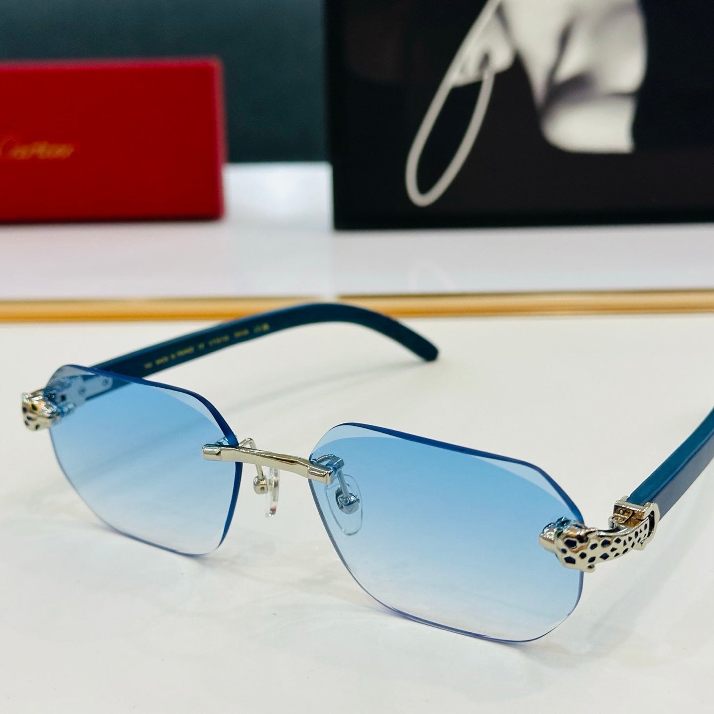 CARTIER PANTHÈRE RIMLESS OVAL FRAME SUNGLASSES 543637 IN METAL